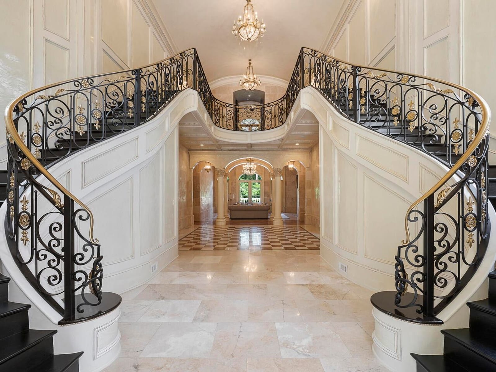 Foyer with iron double staircase