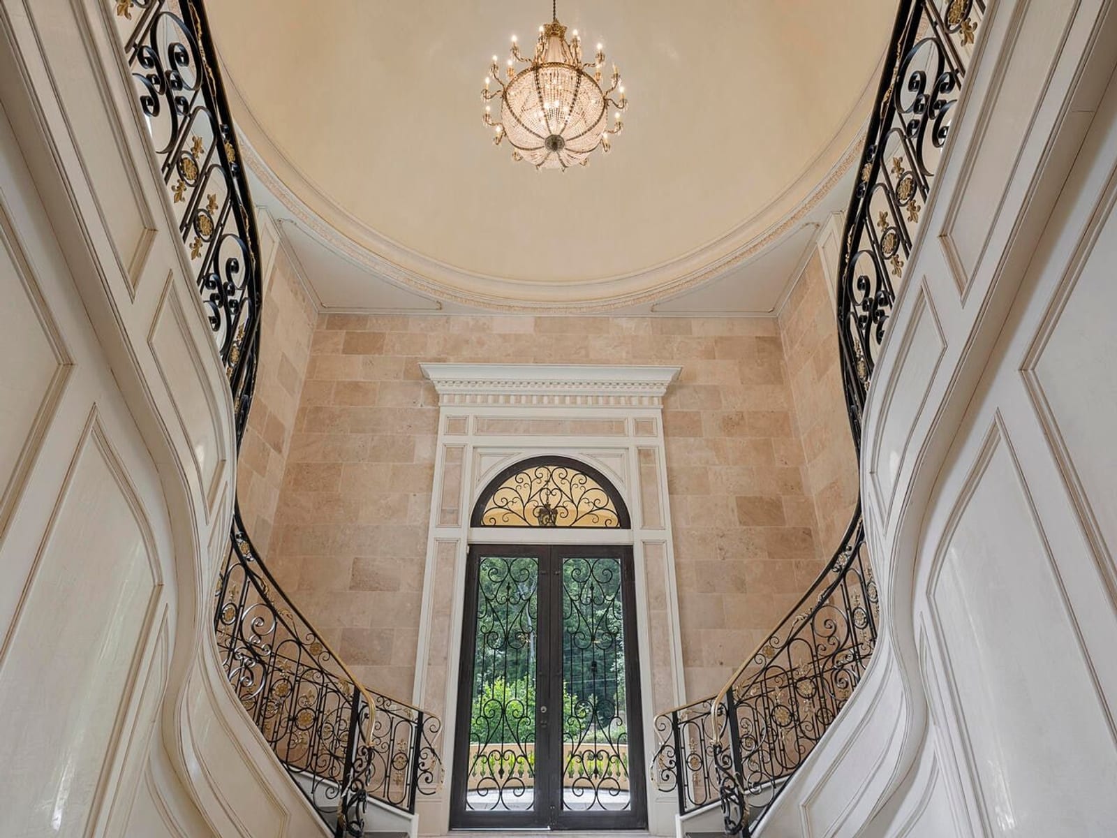 Looking up at the domed foyer ceiling