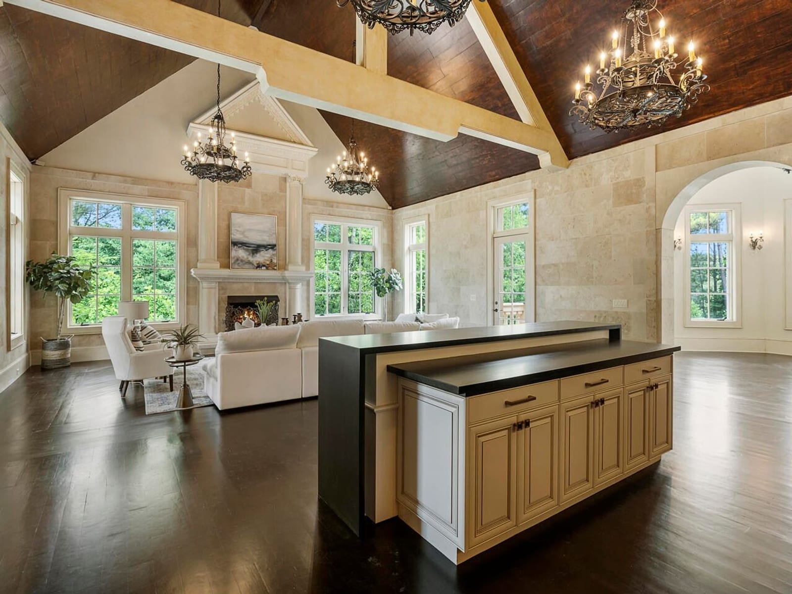Kitchen opening to two-story family room